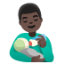 man feeding baby, dark skin tone